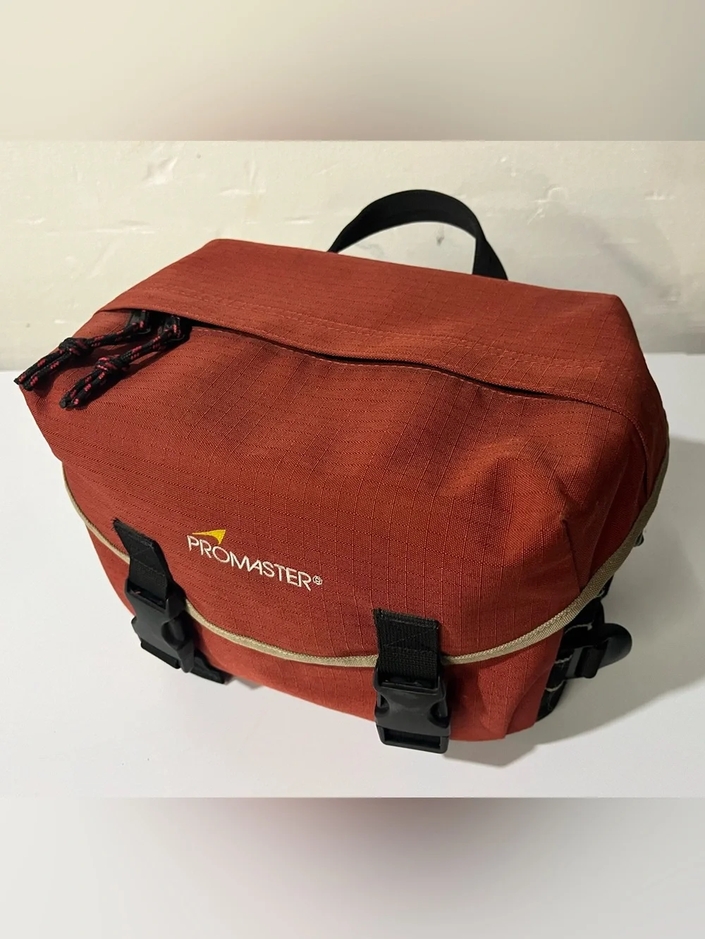 Promaster medium camera case with accessories and organizing pockets, paprika